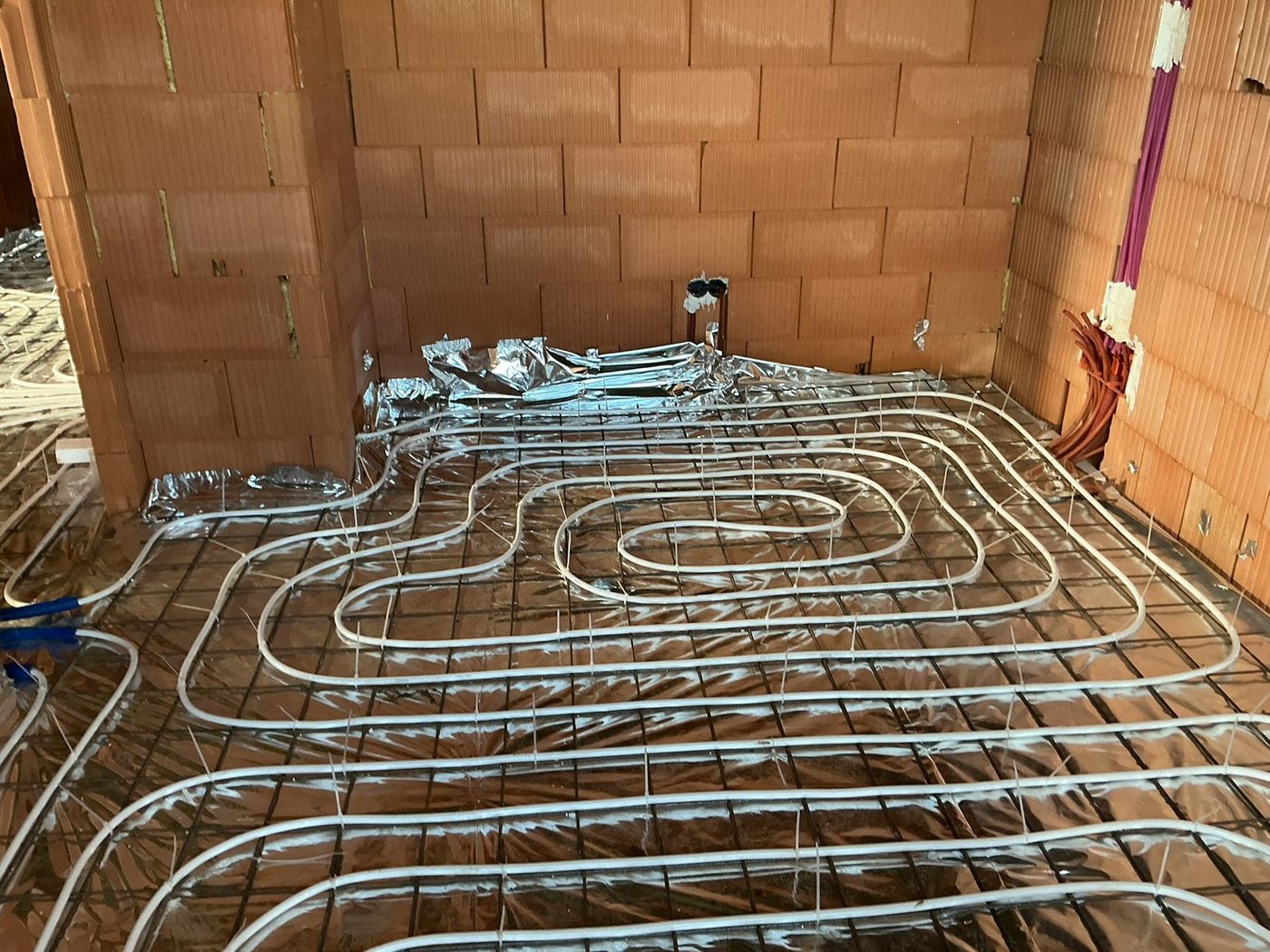 Padlófűtés új épületben